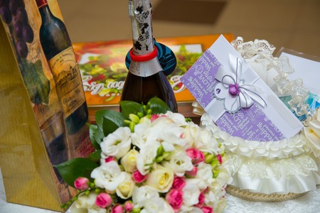 Wedding gifts, champagne, Bridal bouquet Proleteli envelopeの写真素材