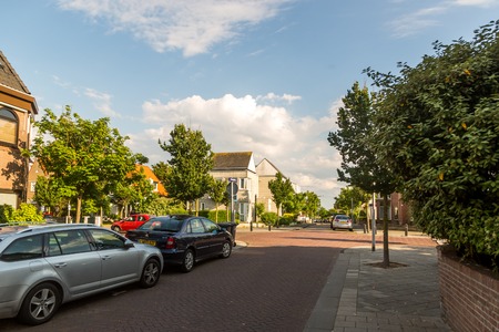 Young man in a canoe rowing orb. Dusseldorf Germanyのeditorial素材
