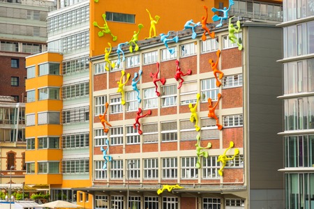DUSSELDORF. GERMANY Junr 04, 2017 Colorful figures on Roggendorfer Haus building.のeditorial素材