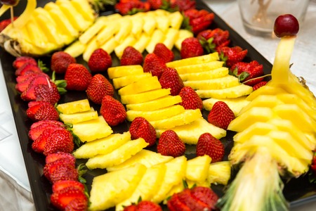 close up Heap of fresh fruits and vegetables on wedding tableの写真素材