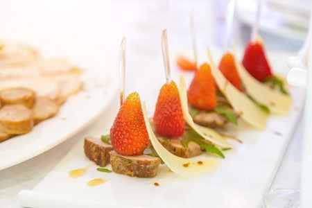 Sweet wild strawberries in plateの写真素材