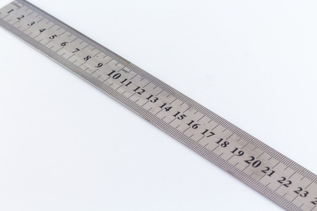 Ruler steel meassuring tool isolated on white backgroundの写真素材