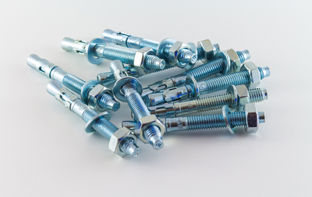 nut and bolts isolated on white backgroundの写真素材