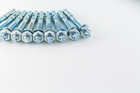 nut and bolts isolated on white backgroundの写真素材