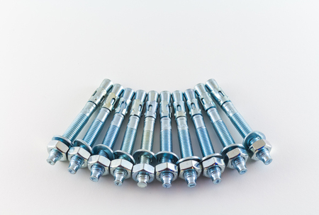 nut and bolts isolated on white backgroundの写真素材
