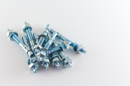 nut and bolts isolated on white backgroundの写真素材