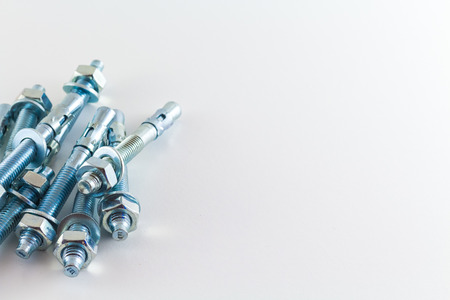 nut and bolts isolated on white backgroundの写真素材