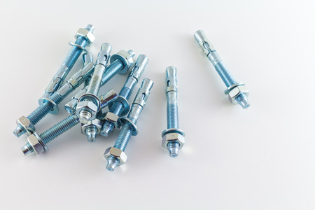 nut and bolts isolated on white backgroundの写真素材
