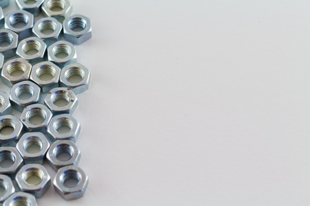 nut and bolts isolated on white backgroundの写真素材