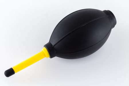 hand blower air duster for lens cleaning camera cleaning isolated on white backgroundの写真素材