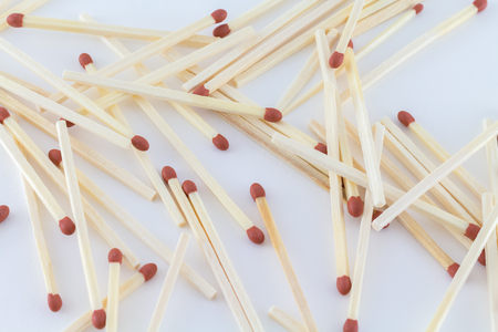 Matchsticks for four or lighting or burning isolated on white backgroundの写真素材