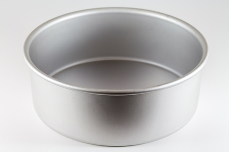 Baking mold for baking bread, pie, cake or pastry in bakery or kitchenの写真素材