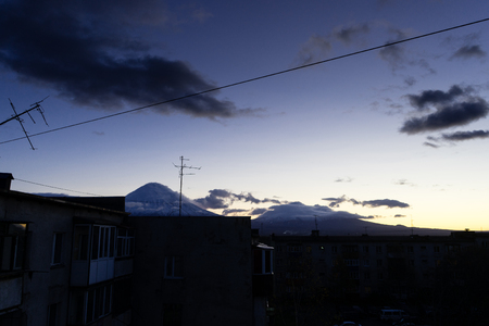 Early morning. A beautiful view on a snow top of Avachinsky volcano. Sunlight goes from a sky.の写真素材