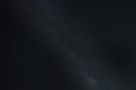 A night sky with the Milky Way band going through it.の写真素材