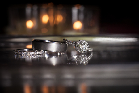 Wedding rings stacked on beautiful background 2の写真素材