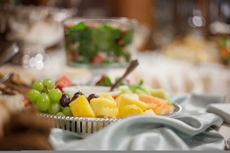 Catered wedding reception with strawberries, chocolate, punch, fruit, nuts, cheese 4の写真素材