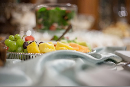 Catered wedding reception with strawberries, chocolate, punch, fruit, nuts, cheese 5