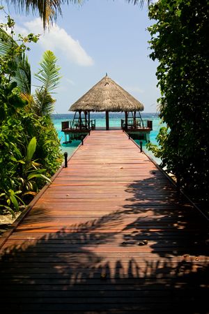 Landing stage in a maldivian islandの写真素材