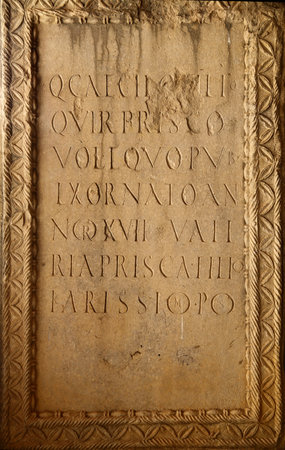Ancient Roman inscriptions on the wall of the Basilica of the Annunciation in Nazareth, Israelの写真素材