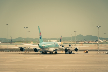 A Korean Air plane is parked on the tarmac のeditorial素材