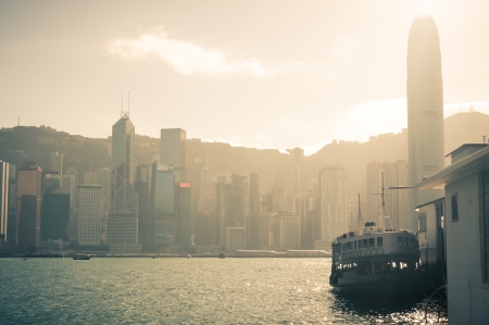 A ferry tied to the dock in Victoria Harbor in Hong Kong のeditorial素材
