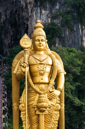 The statue of Lord Murugan that stands outside of the Batu Caves north of Kuala Lumpur, Malaysia.の写真素材