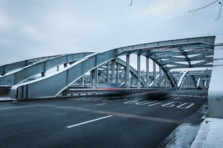 Traffic crosses a bridge in Seoul in early morning.