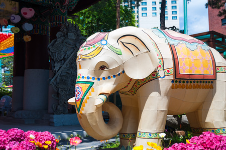 A paper elephant lantern stands outside of Jogyesa Temple in Seoul, South Korea, ahead of Buddha's Birthday on May 6.の写真素材
