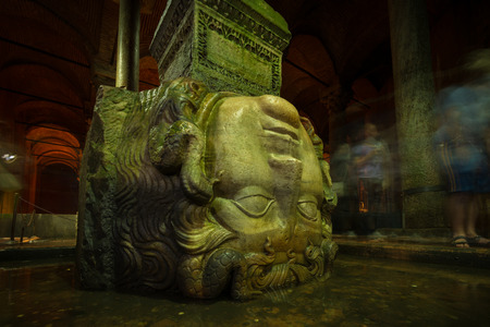 A Medusa head supports a column at the Basilica Cistern in Istanbul の写真素材