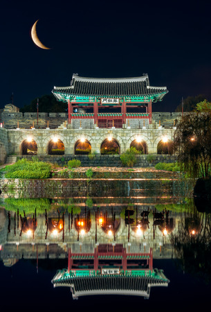 Reflections of a pavilion in the river at Hwaseong Fortress in Suwon, a large city just outside of Seoul, South Korea.のeditorial素材
