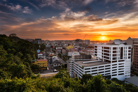 The sun sets over Kota Kinabalu in Sabah province, Malaysian Borneo.の写真素材