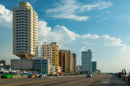 The old architecture of Havana, Cuba, stands across from the Malecon, a long boardwalk that runs along the Caribbean sea.の写真素材