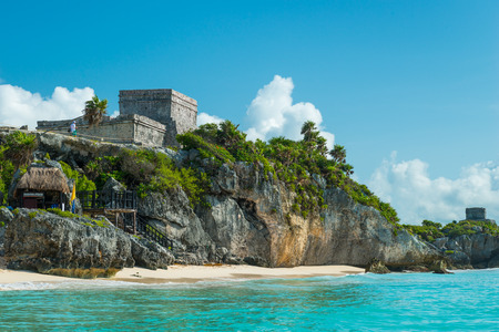 El Castillo, the central piece of the ancient Mayan ruins at Tulum, Mexico, sits atop the cliffside overlooking the Caribbean sea.の写真素材