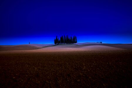 beautiful panorama of sunset in the Tuscany Hills.の写真素材