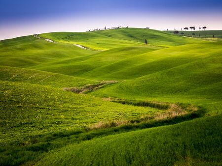 beautiful panorama of sunset in the Tuscany Hills.の写真素材