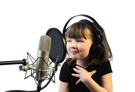little girl satisfied with her song recordingの写真素材
