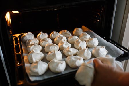 White homemade bizet on the baking sheet. Homemade foodの写真素材