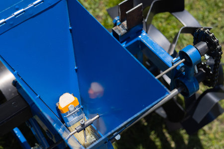 Agricultural machinery. Close-up of technical units and mechanisms of agricultural machinery. Grain feed elementsの写真素材