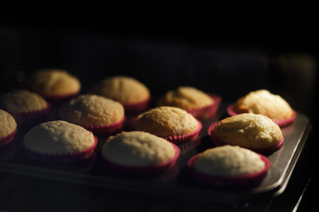 A batch of delicious cupcakes is baking in the oven, filled with natural ingredients and superfoods...