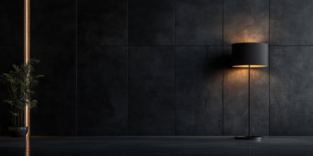 A modern floor lamp stands elegantly, casting a warm yellowish glow against a textured wall. This creates a cozy and inviting atmosphere, perfect for relaxation or entertaining guests.の素材