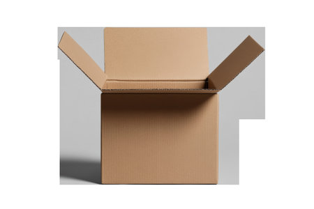An open cardboard box sits ready for new adventures, located in a bright, minimalist setting. Its empty interior invites creativity, perfect for inspiring ideas or organizing treasures.の素材