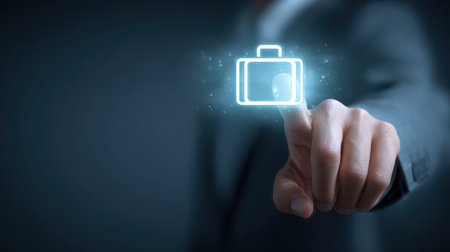 A person dressed in formal attire is reaching out to touch a glowing suitcase icon, symbolizing modern travel and digital planning.の素材