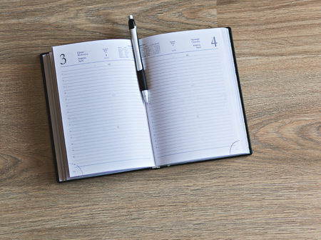 notebook on the tableの写真素材