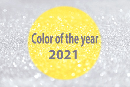 Beautiful festive shine glitter bright glowing ultimate, gray, yellow, illuminating background blur, radiance, text "Color of the year 2021" concept fashion, beauty season 2021 design spring, summer.の写真素材