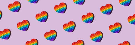 Seamless pattern diagonal banner anti stress popular push pop fidget toyの写真素材