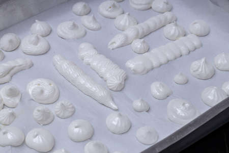 sigh or homemade meringue, a sweet made from egg white and sugar
