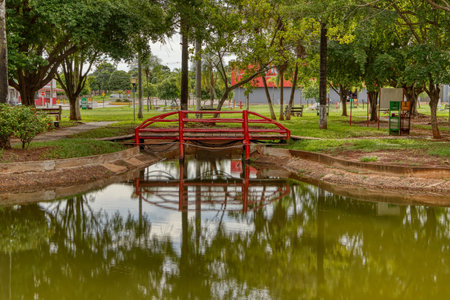 Cassilandia, Mato Grosso do Sul, Brazil - 12 21 2020: Open walking area square Elza Vendrame with green vegetationのeditorial素材