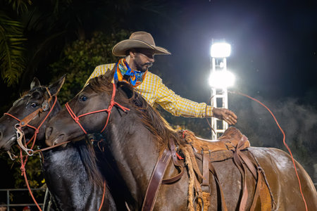 Itaja, Goias, Brazil - 04 22 2023: rodeo event in the horse riding modality called cutianoのeditorial素材