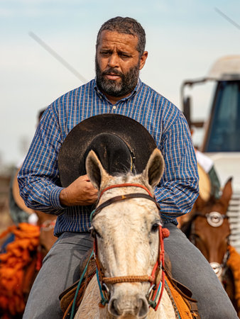 Apore, Goias, Brazil - 05 07 2023: Horseback riding event open to the public on public roads in the Brazilian city of Aporeのeditorial素材