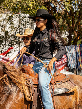 Apore, Goias, Brazil - 05 07 2023: Horseback riding event open to the public on public roads in the Brazilian city of Aporeのeditorial素材